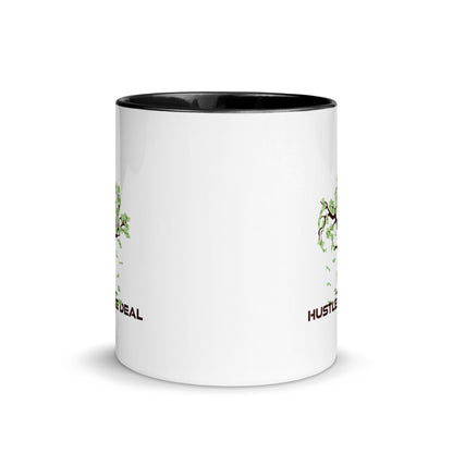 White ceramic coffee mug with black handle and Hustle The Deal money tree design