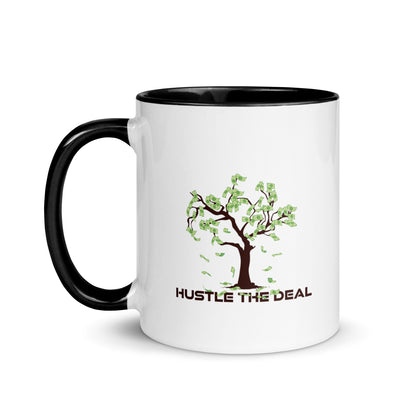 White ceramic coffee mug with black handle and Hustle The Deal money tree design